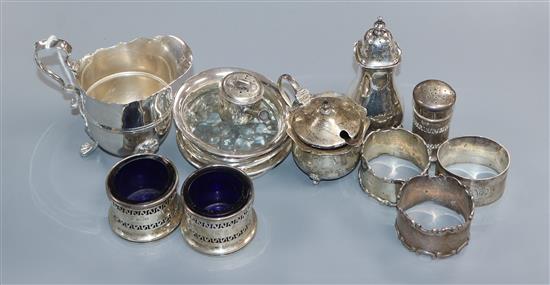 Mixed small silver including a cream jug, Edwardian miniature saucepan pepperette, five condiments, three napkin rings etc.